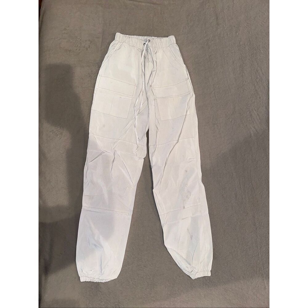 White glow joggers size S